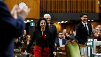 MP Bendayan receives applause while PM Trudeau and Minister Garneau smile