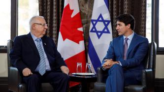 PM Trudeau sits and meets with President Rivlin