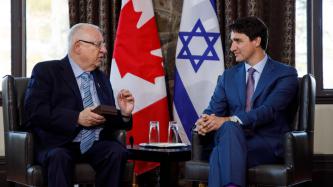 PM Trudeau sits and meets with President Rivlin