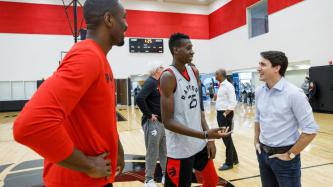 PM Trudeau speaks with Raptors Chris Boucher and Serge Ibaka