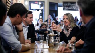 PM Trudeau and MP Mendicino listen to a woman speak