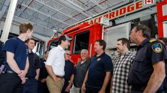 PM Trudeau speaks to a group of first responders and volunteers