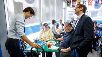 PM Trudeau and MP Bittle share a laugh with two customers
