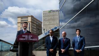 Mayor Don Iveson stands at the podium