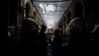 Prime Minister Trudeau and others view the damage to Notre-Dame Cathedral