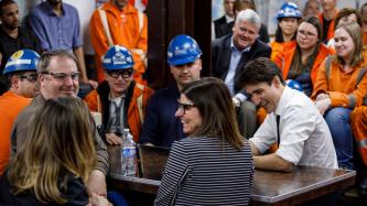 PM Trudeau shares a laugh with steel workers