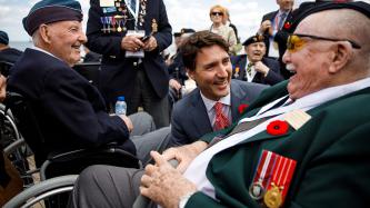 PM Trudeau shares a laugh with Canadian veterans