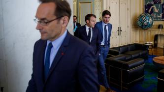 PM Trudeau walks and talks with President Macron