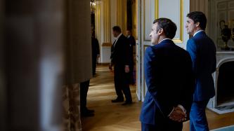 PM Trudeau walks and talks with President Macron