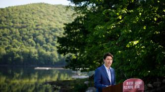 PM Trudeau speaks at the podium