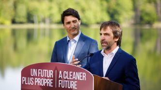 Steven Guilbeault speaks at the podium