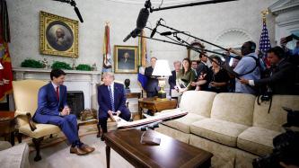PM Trudeau meets with President Trump in front of the media