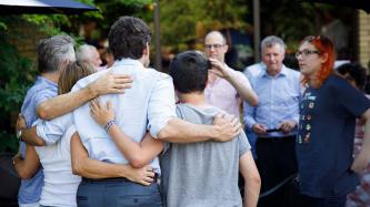 PM Trudeau poses for a photo with a group of people