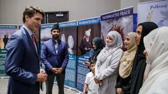 PM Trudeau speaks with women in veils