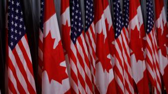 Alternating U.S. and Canadian flags