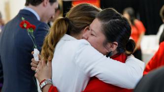 Sophie Grégoire Trudeau hugs a woman