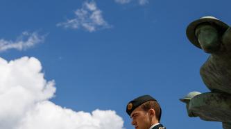 A Canadian soldier stands