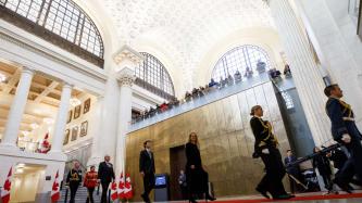 PM Trudeau and Gov. Gen. Payette walk in a procession in the Senate of Canada Building