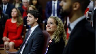 Gov. Gen. Payette and PM Trudeau look upwards