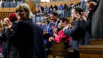 Anthony Rota stands as Members of Parliament applaud