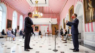 Minister LeBlanc reads an Oath of Office held by Clerk Ian Shugart