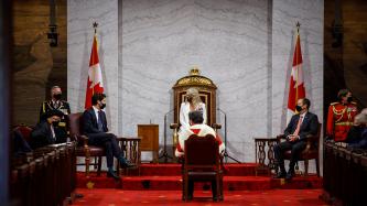 GG Julie Payette looks at PM Trudeau