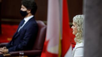 GG Julie Payette and PM Trudeau sit and look on