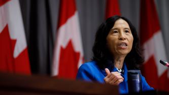 Dr. Tam speaks to the media