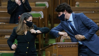 Deputy Prime Minister Chrystia Freeland and Prime Minister Justin Trudeau elbow bump