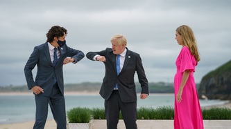 PM Trudeau greets PM Boris Johnson with an elbow bump