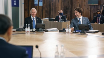 PM Trudeau sits with U.S. President Joe Biden