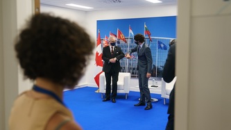 PM Trudeau greets President Levits with an elbow bump