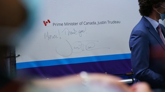 Prime Minister Trudeau's signature on a banner