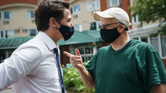 PM Trudeau chats with a man