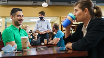 PM Trudeau speaks with a woman