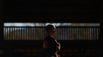 A woman's profile in the glow of sunlight
