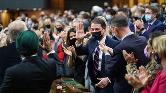 Members of Parliament applaud Anthony Rota