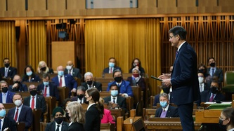 Anthony Rota stands at the Speaker’s Chair and address the HoC