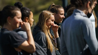 A view of the Canadian women’s soccer team smiling