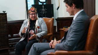 PM Trudeau sits and talks with Chief RoseAnne Archibald