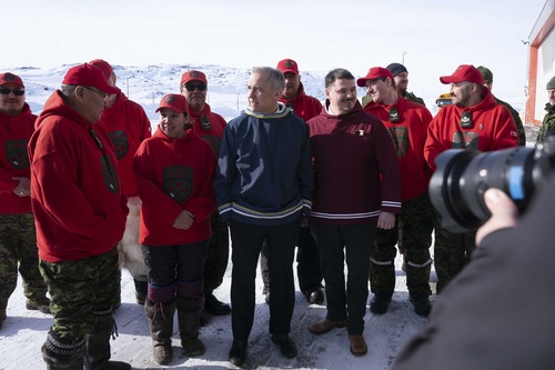 Prime Minister Carney visits Nunavut and speaks with a group of Canadian Rangers. Premier P.J. Akeeagok stands nearby.