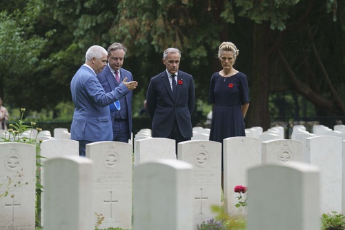 Prime Minister Carney, Diana Fox Carney and Prime Minister De Wever visit the Antwerp Schoonselhof Military Cemetery.