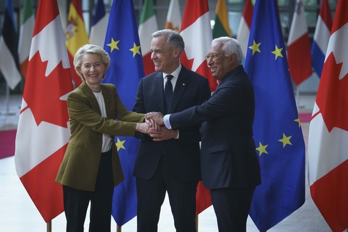 Prime Minister Carney, President von der Leyen, and President Costa are joining hands at the Canada-European Union Summit.