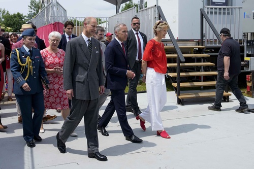 Prime Minister Mark Carney arrives at the national Canada Day ceremony with Madame Carney, Prince Edward and others.