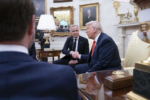 Prime Minister Carney meets with President Trump in the Oval Office. 